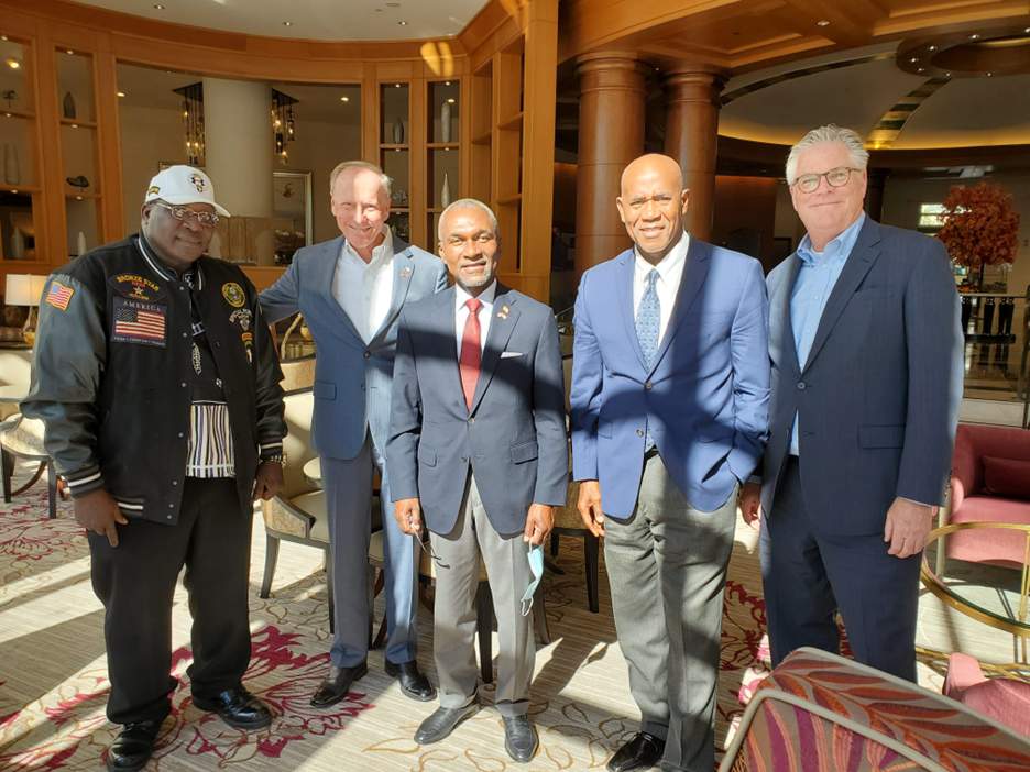 General John Tarnue, Commander Liberian Armed Forces, Ret., Dr. Alan White, Alexander Cummings, Candidate, President of Liberia and his ADC, and Jeff Birrell.